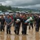 flood victims trapped border