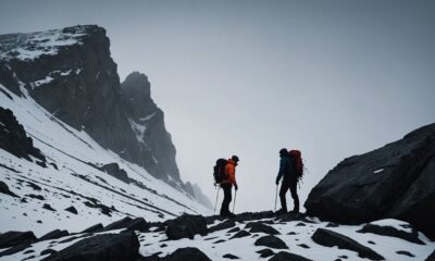 two climbers die bad weather